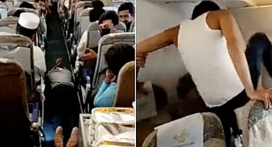 Pakistan-Dubai Uçuşunda Bir Yolcu Uçak Camını Tekmelemeye Başladı