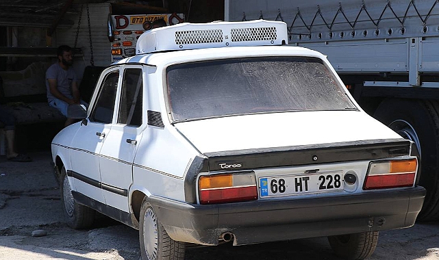 Sıcaktan Bunalan Esnaf 1991 Model Aracının Tavanına Klima Taktı